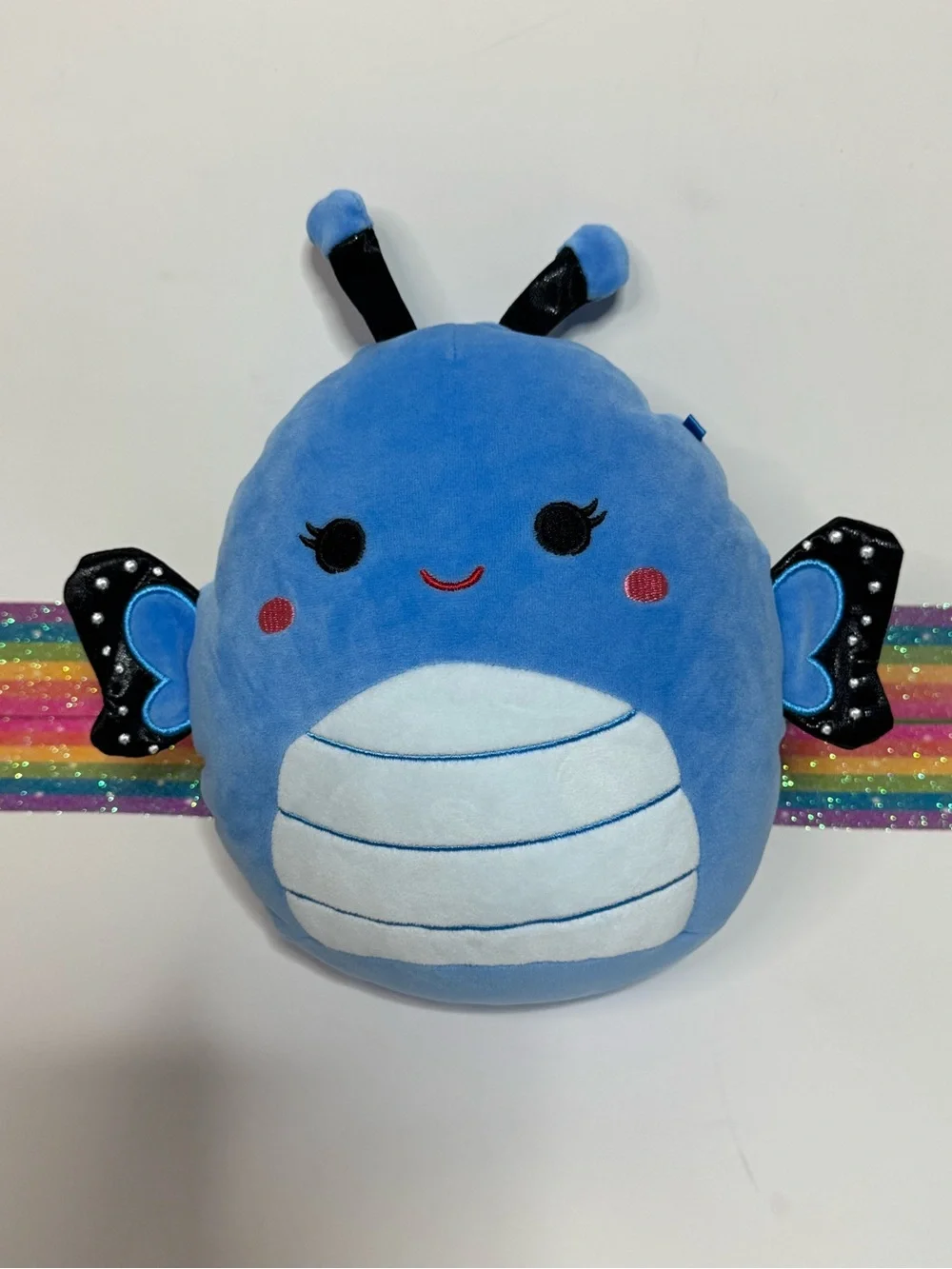 Waverly the Blue Butterfly by Squishmallows, featuring a bright blue body